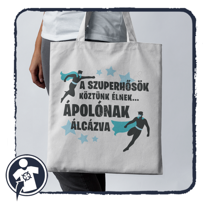 A szuperhősök köztünk élnek... ÁPOLÓNAK álcázva - feliratos fehér vászonszatyor